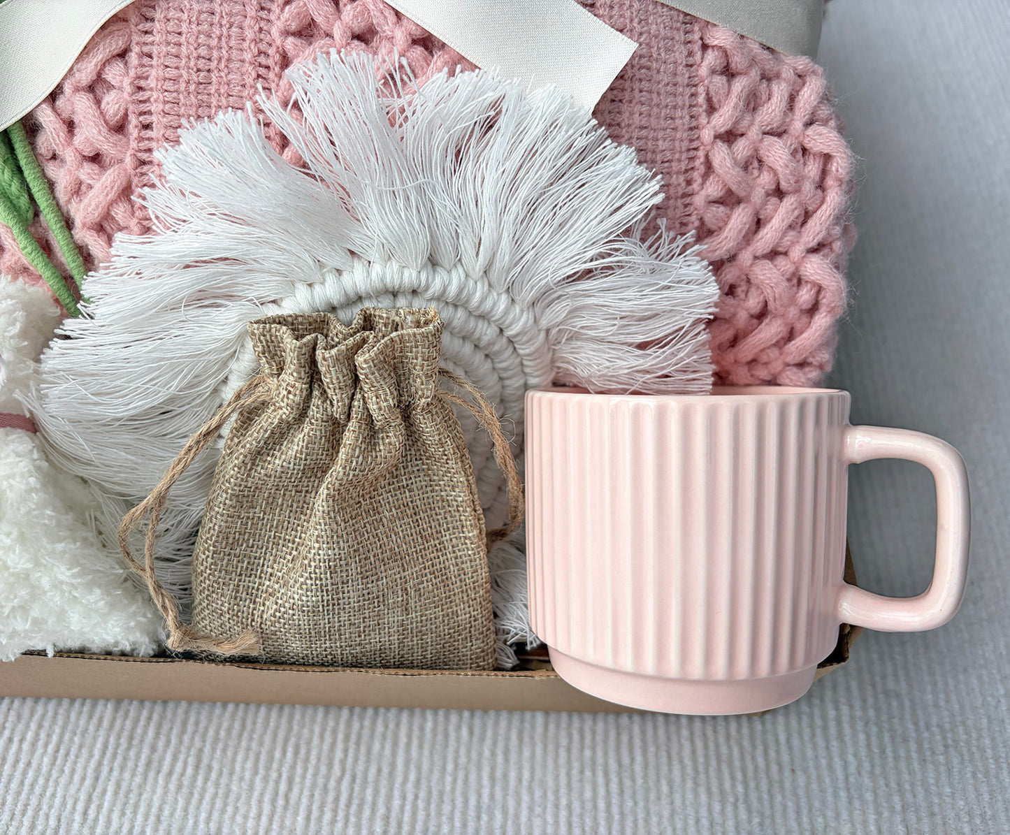 Blush Pink Cozy Gift Basket for Her – Self Care Gift Box with Knit Blanket, Pink Mug, Fuzzy Socks, Crochet Tulip Bouquet & Relaxation Essentials komorebi INC
