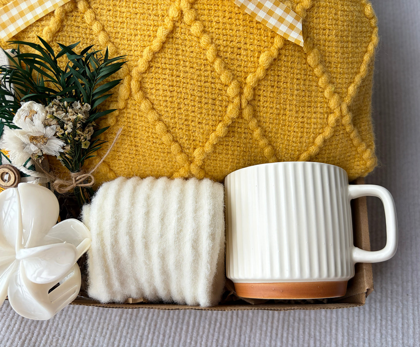 Sunny Yellow Self-Care Gift Basket for Her | Cozy Knit Blanket, Ceramic Mug, Fuzzy Socks, Daisy Notebook & Dried Flower Decor komorebi INC