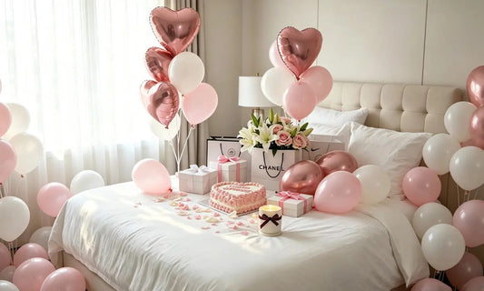 Cozy romantic bedroom birthday styling with pink heart balloons, birthday cake, gift packages and fresh flowers, perfect inspiration for sending birthday gift boxes for her
