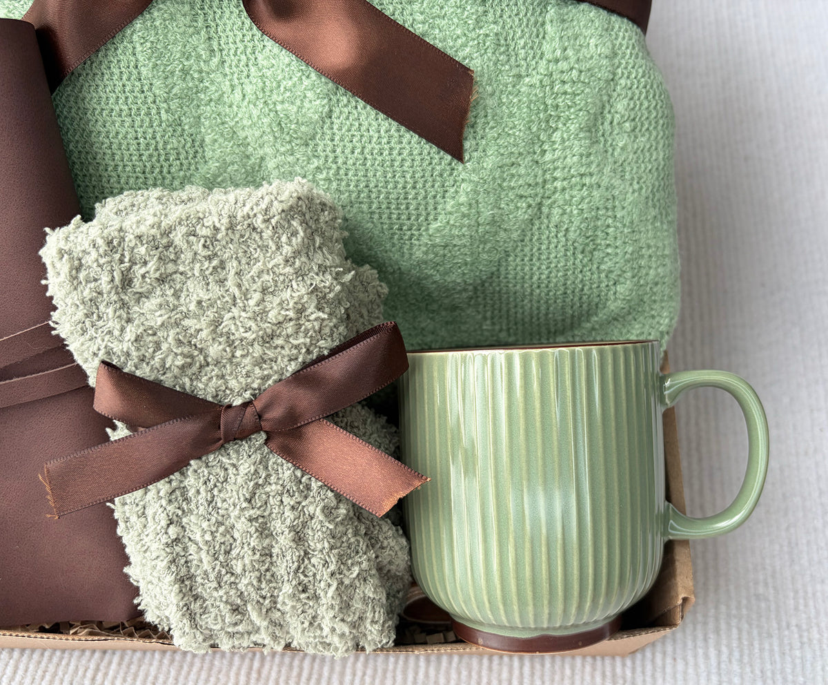 Gift Basket for Men | Cable Knit Blanket, Ribbed Sage Mug, Fuzzy Socks & Leather Journal Gift Basket komorebi INC