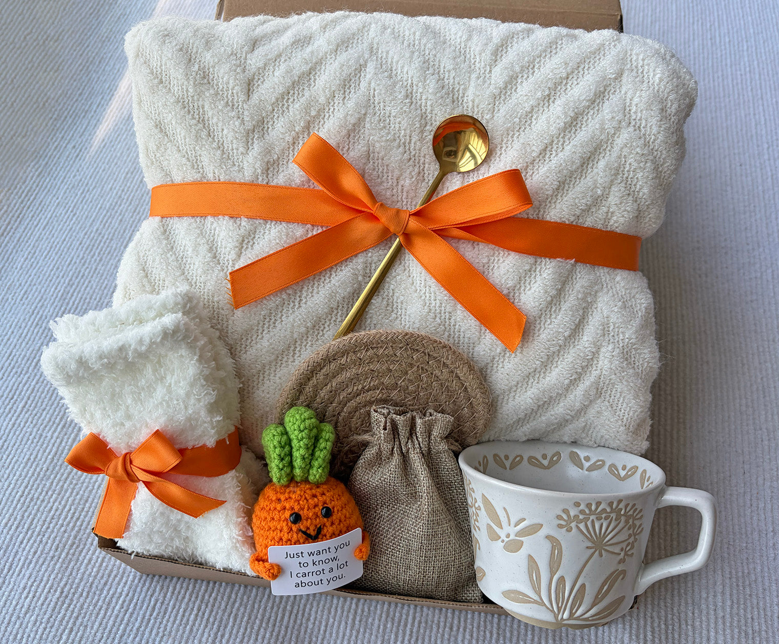 Cream Cozy Gift Basket for Her – Cute Self Care Gift Box with Knit Blanket, Mug, Fuzzy Socks, Coffee Spoon & Crochet Carrot Keepsake komorebi INC