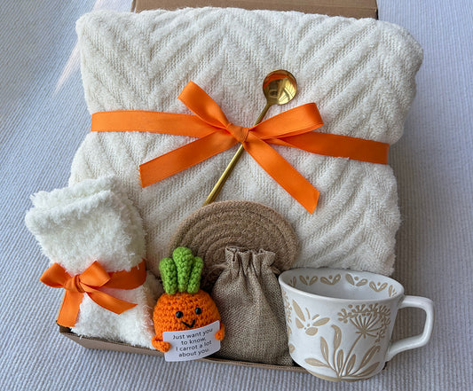 Cream Cozy Gift Basket for Her – Cute Self Care Gift Box with Knit Blanket, Mug, Fuzzy Socks, Coffee Spoon & Crochet Carrot Keepsake komorebi INC