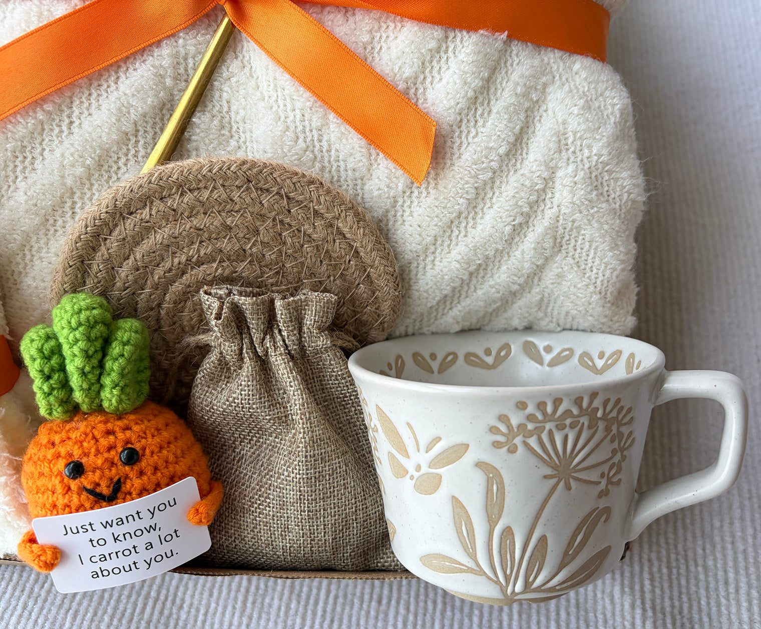 Cream Cozy Gift Basket for Her – Cute Self Care Gift Box with Knit Blanket, Mug, Fuzzy Socks, Coffee Spoon & Crochet Carrot Keepsake komorebi INC