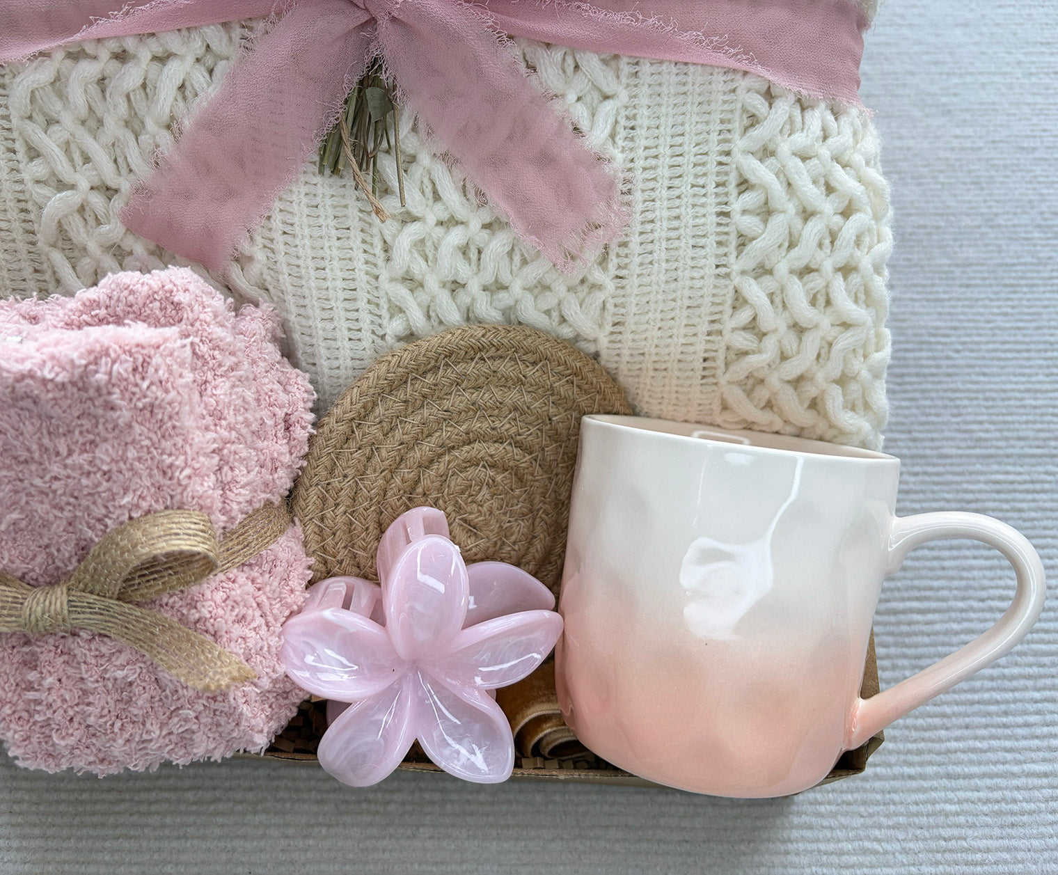 Pastel Self Care Gift Basket | Cable Knit Blanket, Pink Gradient Mug, Bath Puff & Dried Flower Gift for Her komorebi INC