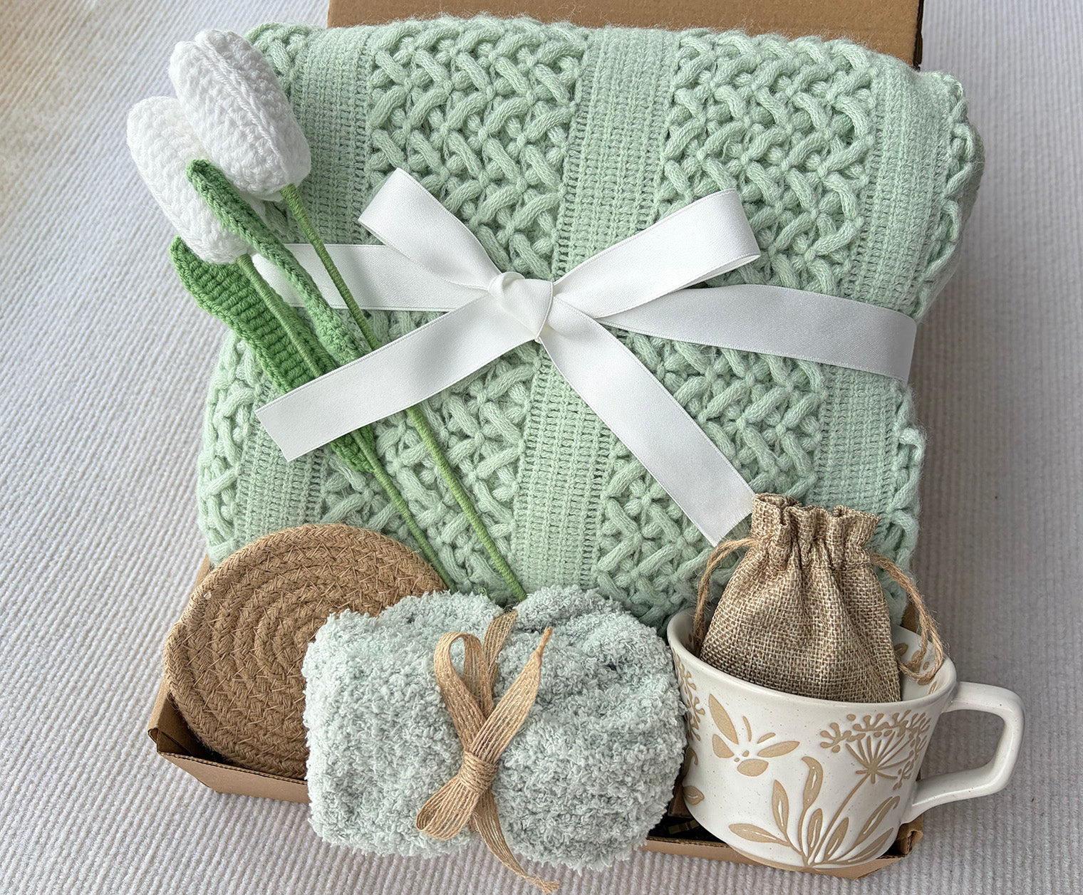 Mint Green Cozy Gift Basket for Her – Self Care Gift Box with Blanket, Mug, Fuzzy Socks, Crochet Tulip Bouquet & Relaxation Essentials komorebi INC