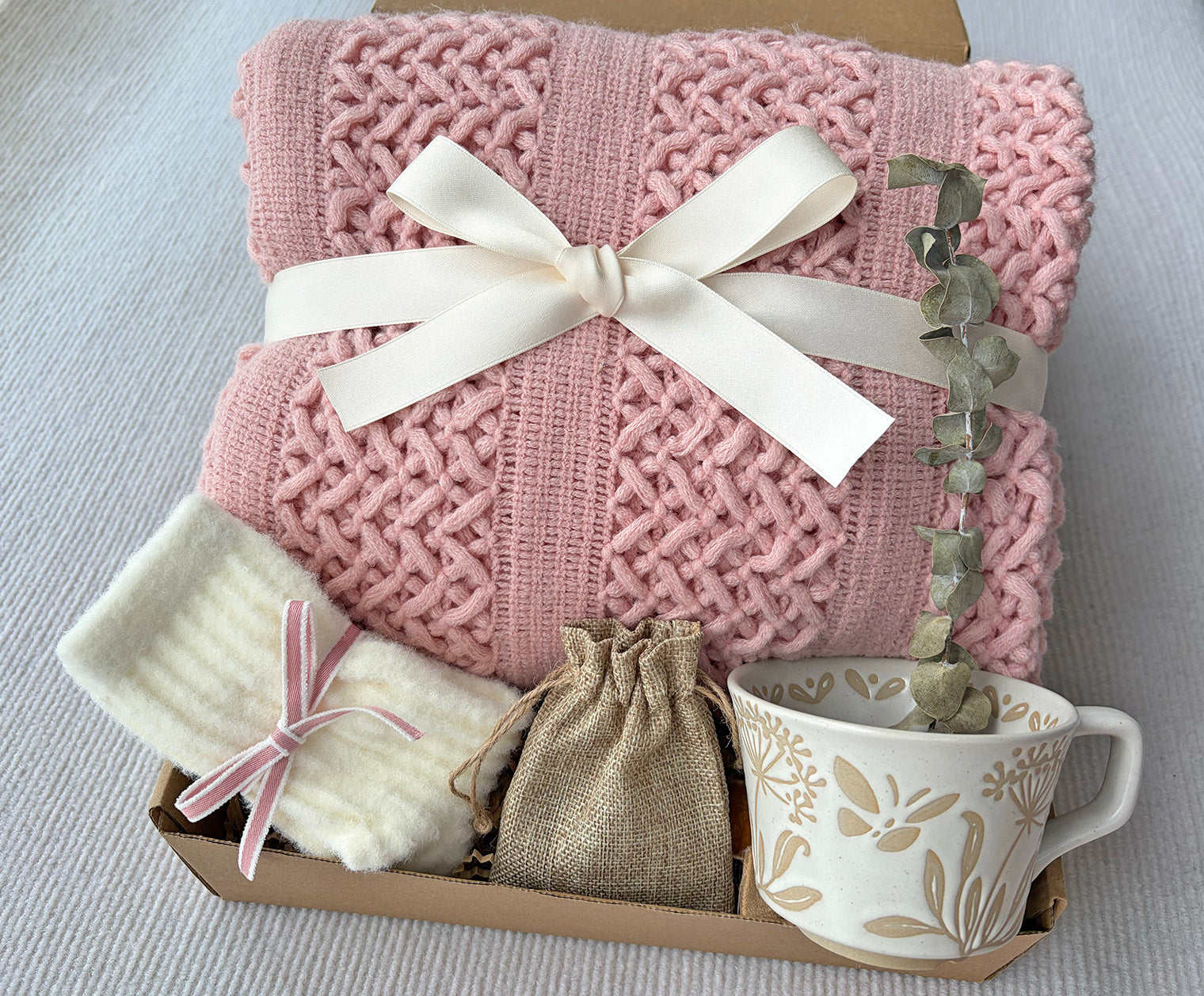 Soft Blush Pink Cozy Gift Box | Cable Knit Blanket, Botanical Mug, Fuzzy Socks & Scent Bag Gift Basket komorebi INC