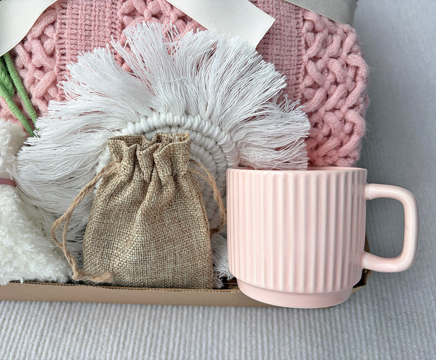 Blush Pink Cozy Gift Basket for Her – Self Care Gift Box with Knit Blanket, Pink Mug, Fuzzy Socks, Crochet Tulip Bouquet & Relaxation Essentials komorebi INC
