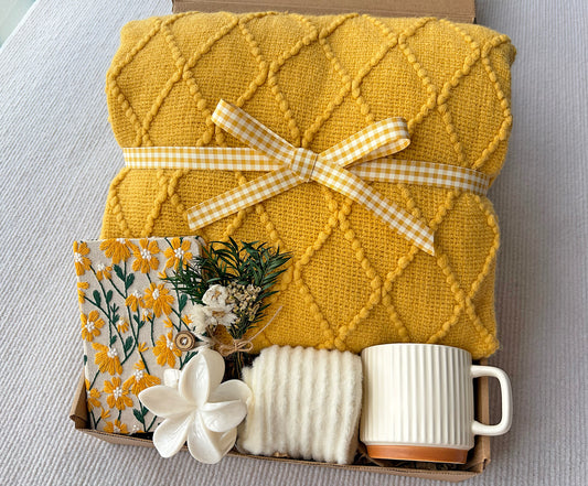 Sunny Yellow Self-Care Gift Basket for Her | Cozy Knit Blanket, Ceramic Mug, Fuzzy Socks, Daisy Notebook & Dried Flower Decor komorebi INC