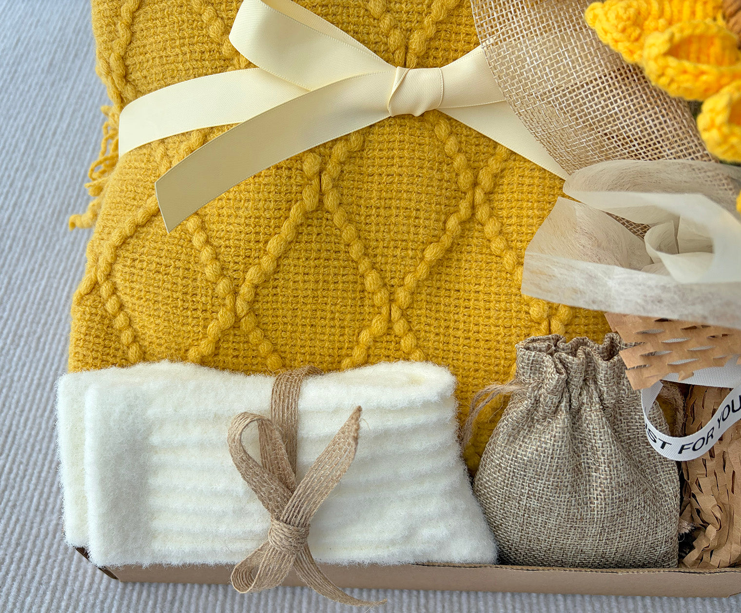 Yellow Self-Care Gift Basket for Her | Cozy Knit Blanket, Crochet Sunflower Bouquet, Fuzzy Socks & Scented Sachet komorebi INC