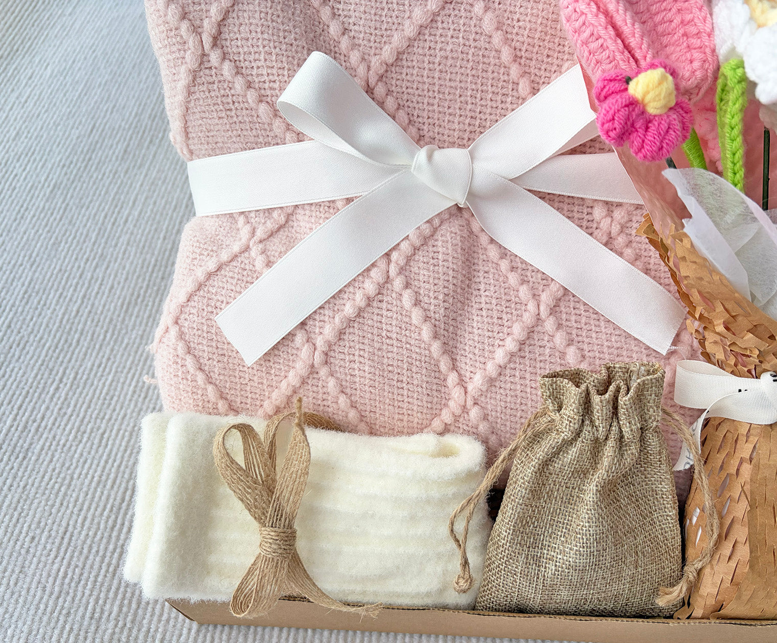 Pink Geometric Knit Blanket Gift Basket with Handmade Crochet Flowers | Cozy Self Care Present komorebi INC